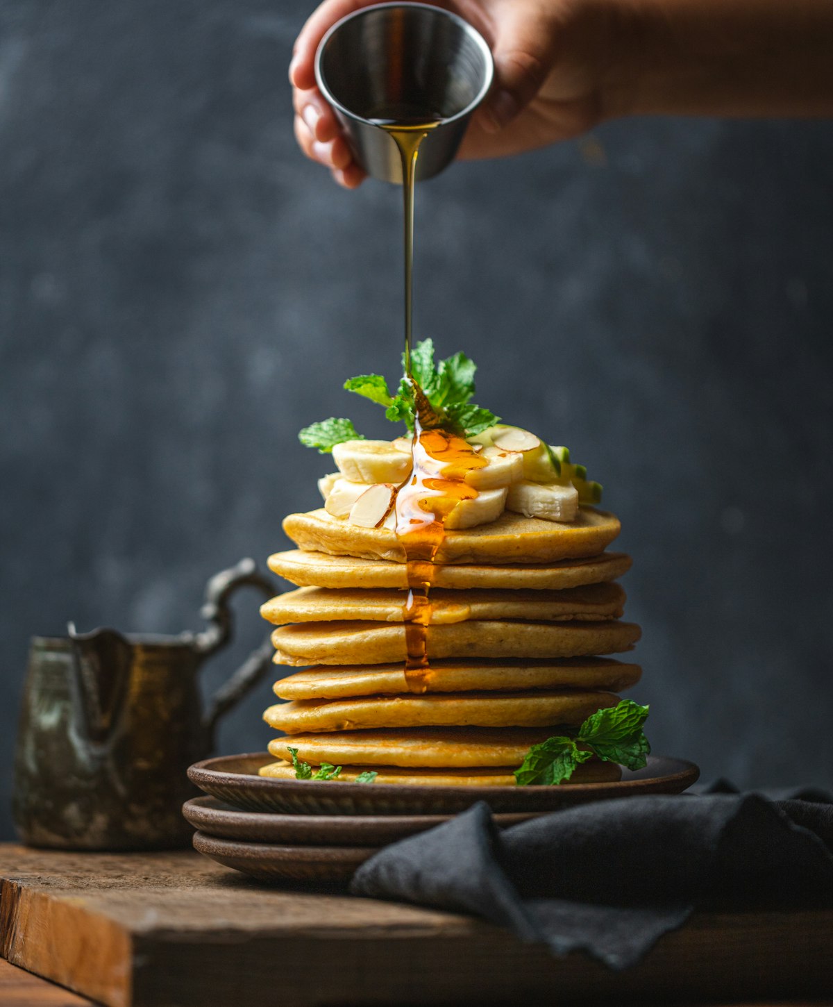 Stack of fluffy buttermilk pancakes with syrup